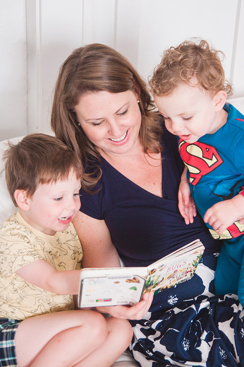 Homeschooling mom settles in with the kids and a picture book