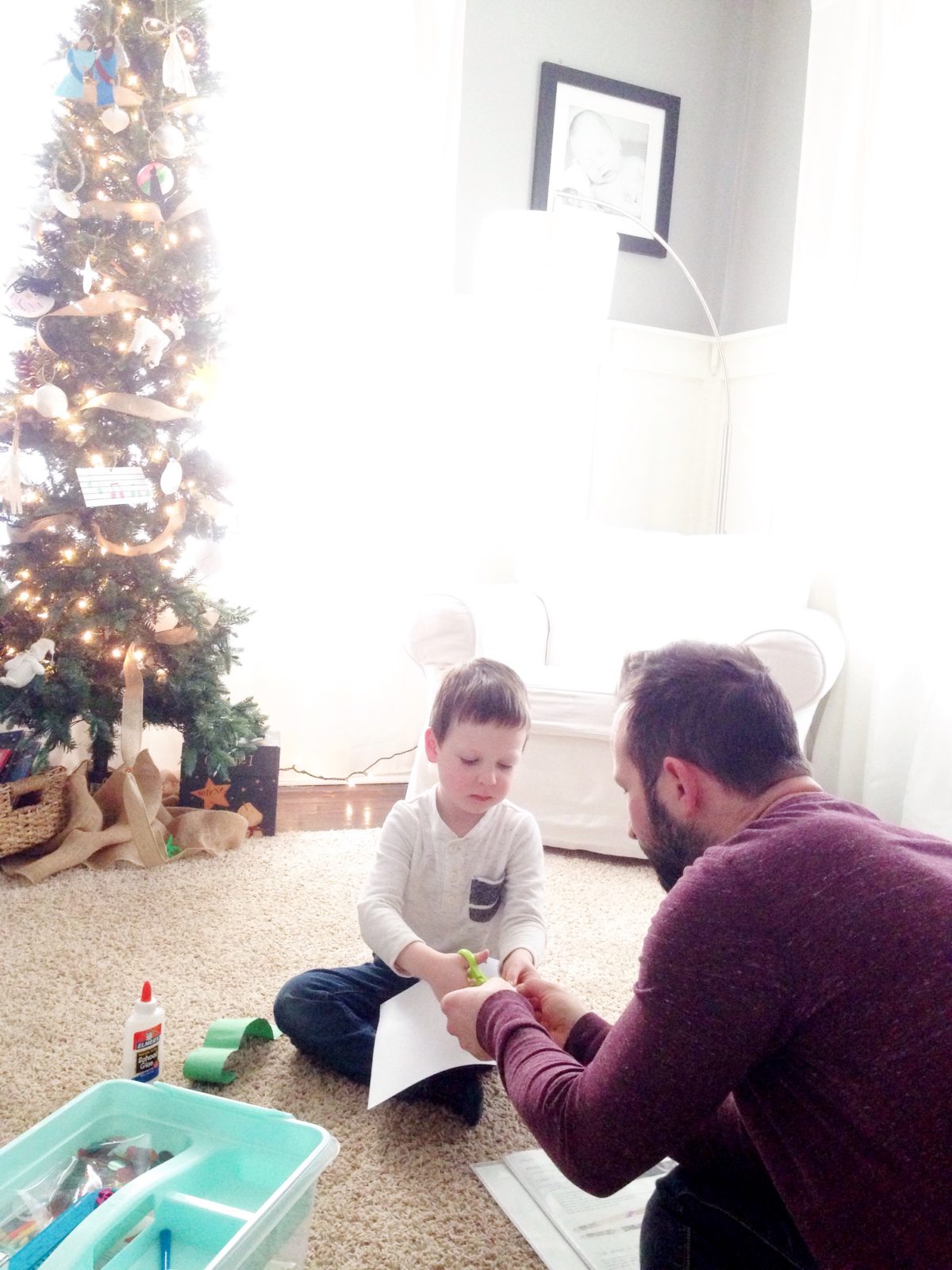 Reading Scripture to Littles Preschooler and Daddy Working on Truth in the Tinsel Advent Ornament